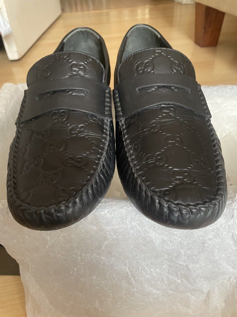 Gucci Black GG Embossed Leather Loafers (Category: Loafers) located in Muntinlupa City. Submitted by bestoption4u (Listing ID 1463349323, Image 3). Description: - Authentic Gucci Loafers - Leather Upper and sole, Black with Iconic GG Embossed Pattern - Made in Italy - Versatile: Dress up or down - Size GO 7.