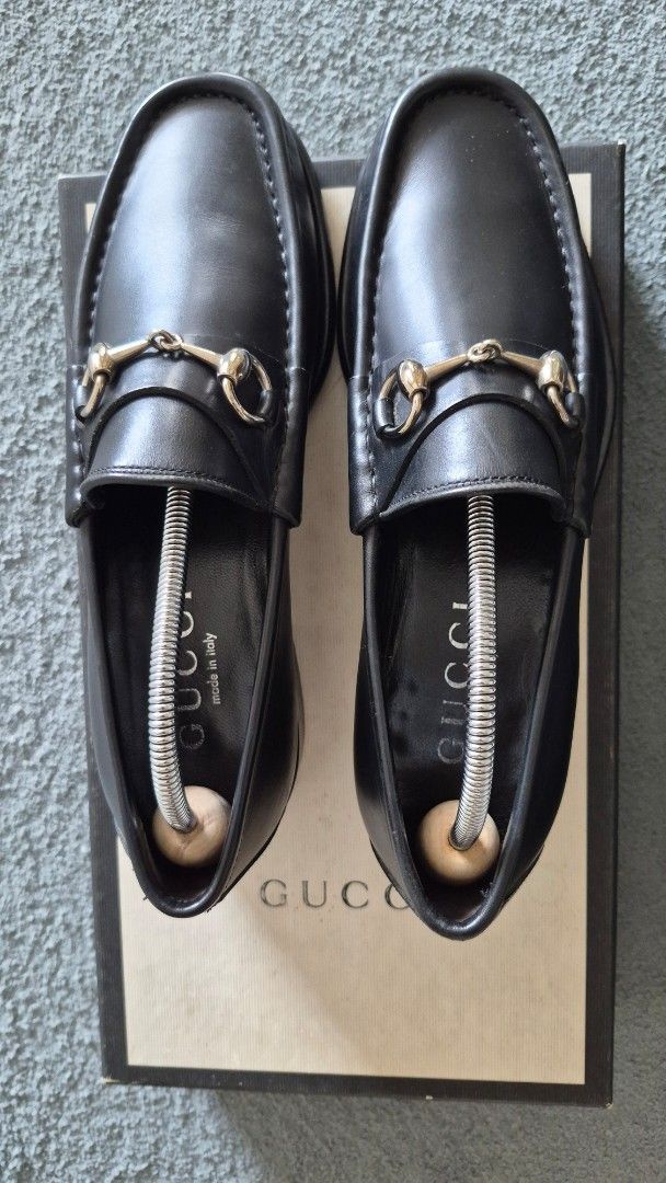 Gucci Black Leather Horsebit Loafers (Category: Casual Shoes) located in Paranaque City. Submitted by jag_1028 (Listing ID 1463331103, Image 1). Description: - Classic Gucci loafers in black leather - Iconic horsebit detail - Made in Italy - Comes with original box and dust bag - Timeless and versatile for any wardrobe.