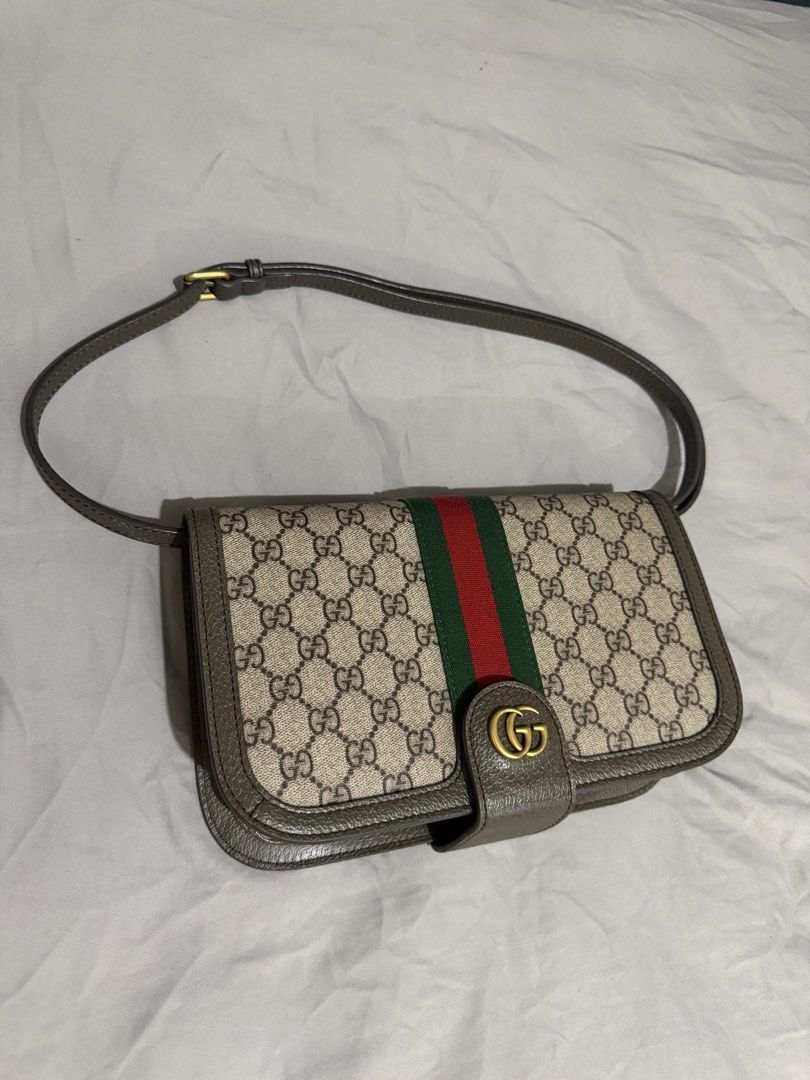 Gucci Classic GG Monogram Canvas Bag (Category: Luxury Bags & Wallets) located in Makati City. Submitted by staraby (Listing ID 1463330574, Image 2). Description: - Classic GG monogram canvas bag - Detachable inner pouch included - Multiple card slots inside - Secure zipper closure - Comes with dust bag and box - Great for everyday use.
