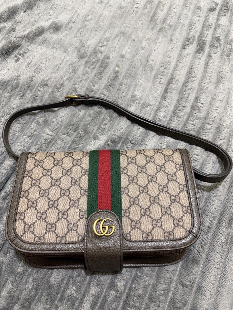 Gucci Classic GG Monogram Canvas Bag (Category: Luxury Bags & Wallets) located in Makati City. Submitted by staraby (Listing ID 1463330574, Image 1). Description: - Classic GG monogram canvas bag - Detachable inner pouch included - Multiple card slots inside - Secure zipper closure - Comes with dust bag and box - Great for everyday use.