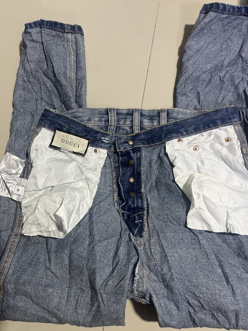 Gucci Denim Jeans (Category: Jeans) located in Manila. Submitted by joann_2815 (Listing ID 1463412723, Image 1). Description: - Classic blue Gucci denim jeans - Button fly closure - Iconic Gucci logo tag at the waist - Subtle embroidery on back pockets - Versatile wash, perfect for any outfit - Essential wardrobe staple.