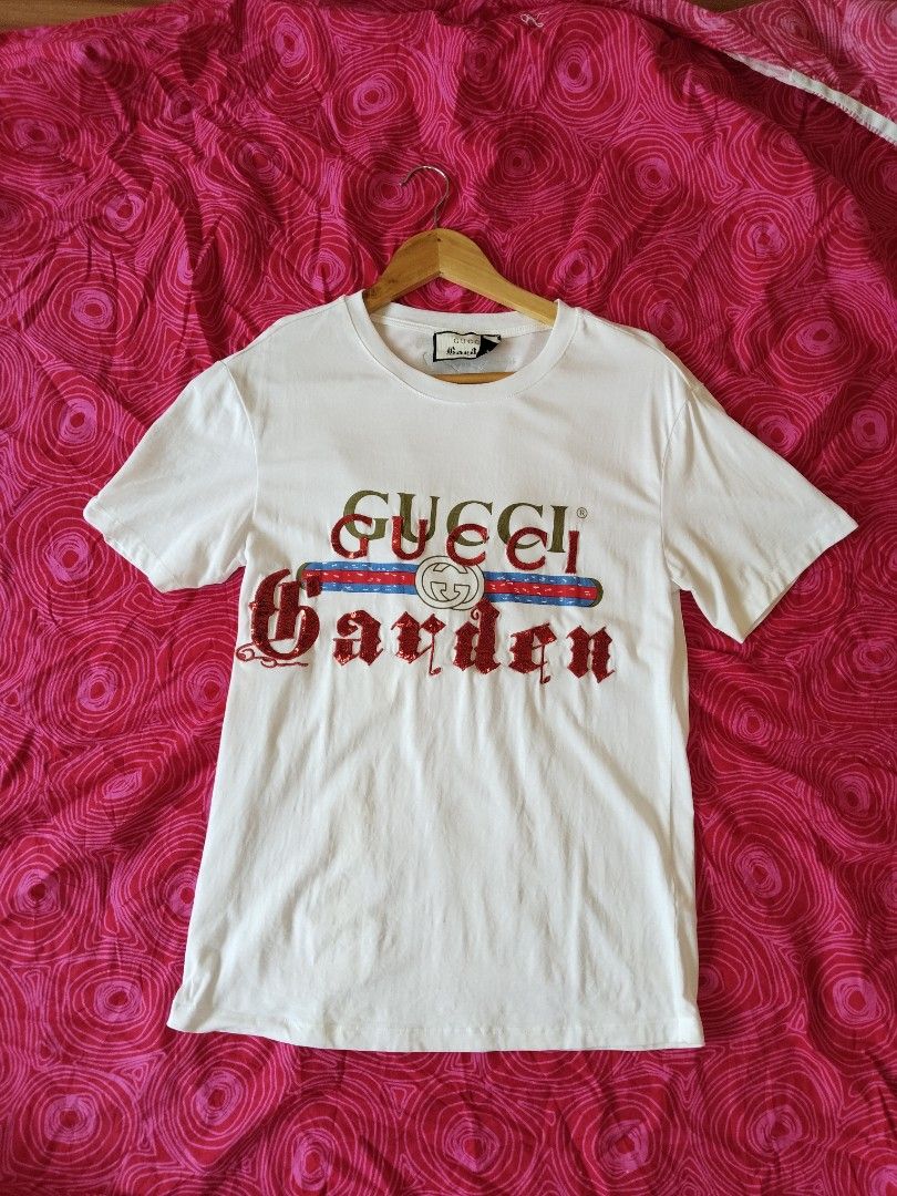Gucci Garden Special Edition Shirt (Category: Shirts) located in Mabalacat. Submitted by al_amin_thrift (Listing ID 1463339845, Image 1). Description: 🏆 Gucci Garden Special Edition T-Shirt — White Brand: Gucci — Gucci Garden Collection Size: S (Standard Fit) Origin: Made in Italy — Authentic luxury piece Color: Crisp White with multi-tone embroidered & sequin details ✨ Details: - Exclusive Gucci Garden design — iconic limited-edition graphic ​ 