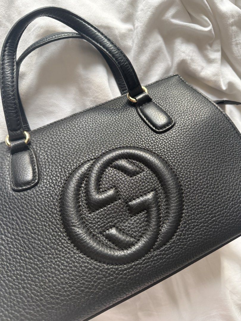 Gucci Soho Leather Medium satchel (Category: Luxury Bags & Wallets) located in Manila. Submitted by noblebird-96e2 (Listing ID 1463413319, Image 3). Description: - Black Leather Gucci Soho Disco Bag - Textured leather with embossed interlocking G logo - Top handles and detachable shoulder strap - Gold-toned hardware - Interior zip pocket .
