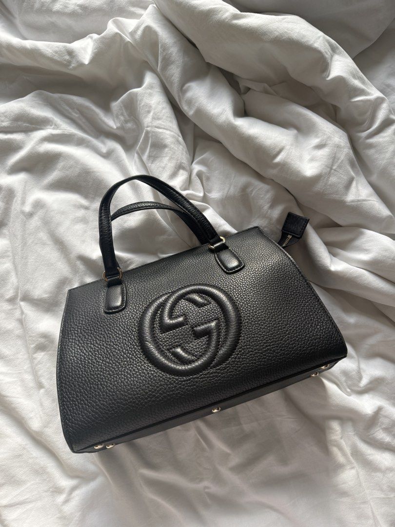 Gucci Soho Leather Medium satchel (Category: Luxury Bags & Wallets) located in Manila. Submitted by noblebird-96e2 (Listing ID 1463413319, Image 1). Description: - Black Leather Gucci Soho Disco Bag - Textured leather with embossed interlocking G logo - Top handles and detachable shoulder strap - Gold-toned hardware - Interior zip pocket .