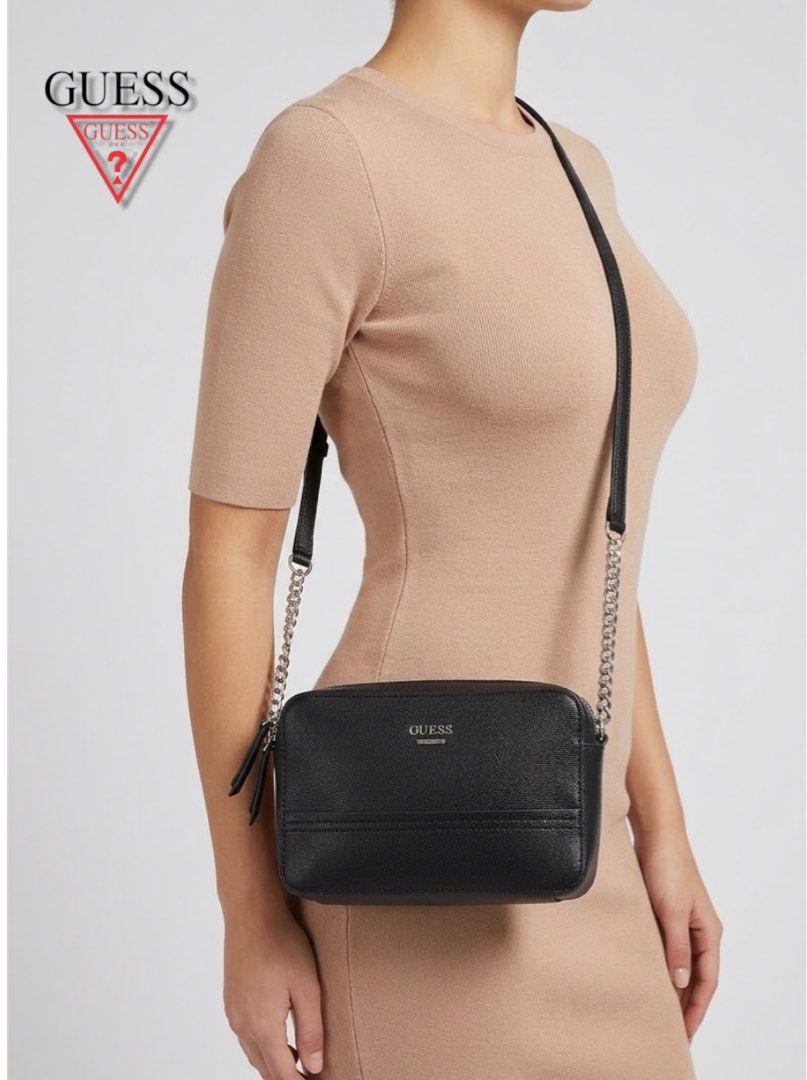 Guess Devyn Black Shoulder Bag with Chain Strap (Category: Shoulder Bags) located in Cebu City. Submitted by gabgaaab (Listing ID 1463427178, Image 1). Description: - Guess Devyn Black Shoulder Bag with Chain Strap - New with tag - Versatile strap options: chic chain strap and an adjustable strap - Secure zipper closure for the main compartment - Actual pics posted.