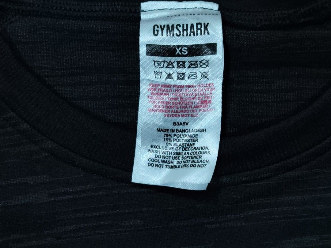 Gymshark Croptop (Category: Activewear) located in General Santos City (Dadiangas). Submitted by alfredanth42291 (Listing ID 1463392842, Image 3). Description: GYMSHARK CROP TOP dark grey womens XS W: 11.5-17 L: 13.5 -crop top -79% polyamide -15% polyester -6% elastane ✓✓excellent condition 350 #gym #pickleball #sports #yoga.