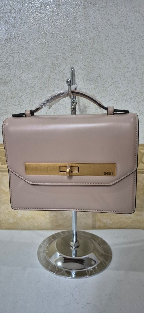 H14-450 Santa Lolla Hard Structured Handbag (Category: Luxury Bags & Wallets) located in Valenzuela. Submitted by dailyhappyfinds (Listing ID 1463439583, Image 1). Description: BRAND: Santa Lolla -Brand new without tag -Handbag only, missing sling strap, with minor dents and hairline scratches on metal part -Please check last photo for details *Mall pullout/ factory pullout. Please manage your expectations..