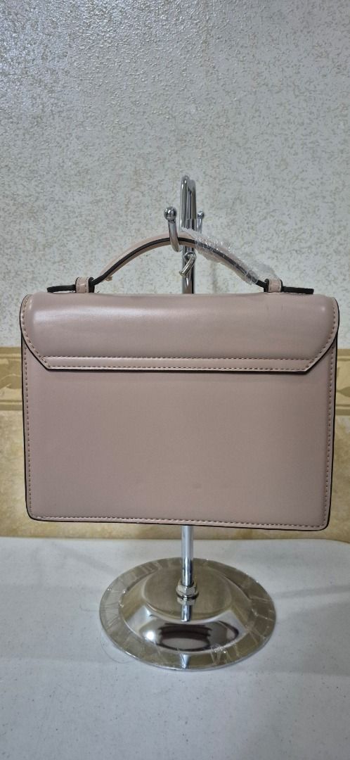 H14-450 Santa Lolla Hard Structured Handbag (Category: Luxury Bags & Wallets) located in Valenzuela. Submitted by dailyhappyfinds (Listing ID 1463439583, Image 2). Description: BRAND: Santa Lolla -Brand new without tag -Handbag only, missing sling strap, with minor dents and hairline scratches on metal part -Please check last photo for details *Mall pullout/ factory pullout. Please manage your expectations..