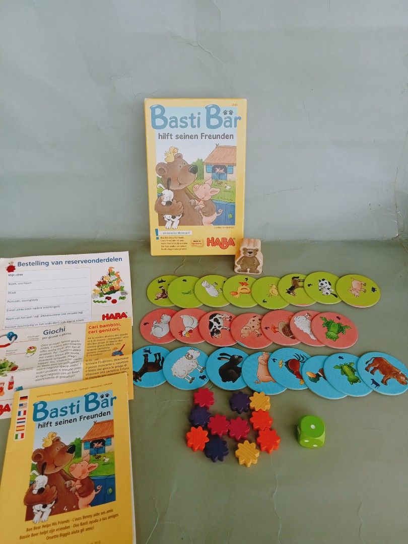 HABA Ben Bear Helps His Friends Memory Game (Category: PlayStation) located in Rosario. Submitted by elysedeclutter (Listing ID 1463379992, Image 1). Description: - Fun memory game for kids aged 3-8. - Helps Ben Bear find his friends. - Develops concentration and memory skills. - Includes: game board, animal tiles, flower tokens, and a die. - Quick playtime: about 10 minutes. - Suitable for 2-4 players..