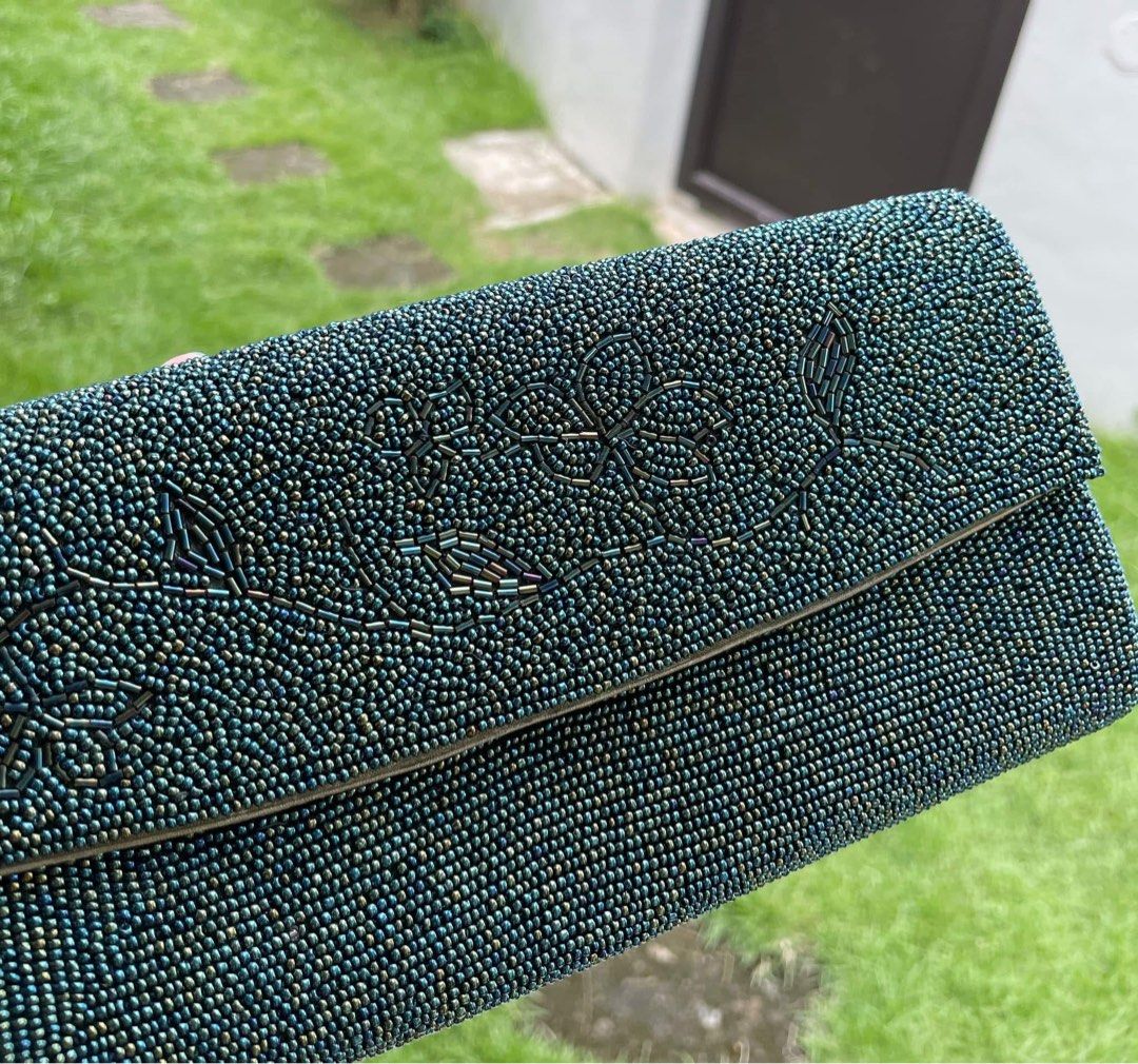 Handcrafted beaded clutch (Category: Clutches) located in Bulacan. Submitted by thriftbagcollections (Listing ID 1463462470, Image 3). Description: Handcrafted beaded clutch,excellent condition!Approx;H-3.5”W-7.8”.