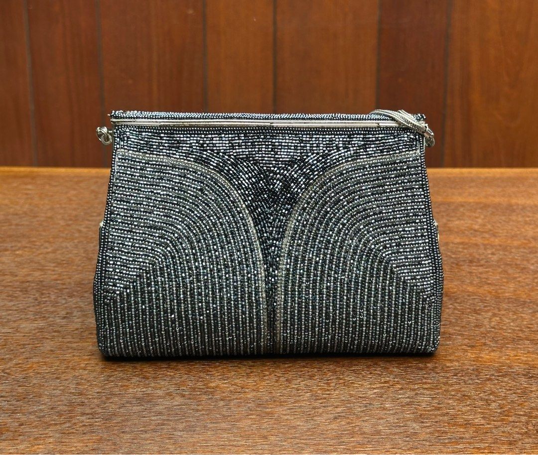 Handcrafted Lumy beaded clutch (Category: Clutches) located in Bulacan. Submitted by thriftbagcollections (Listing ID 1463398302, Image 2). Description: Handcrafted Lumy beaded clutch with box,very good condition.Approx:H- 5”W-6.5” handle 4.5”.