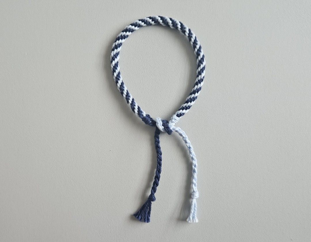 Handmade bracelet - Navy Blue & Light Blue Spiral (Category: Bracelets) located in Bacoor. Submitted by amity.cord (Listing ID 1463386552, Image 1). Description: Handmade bracelet made from crochet yarn..
