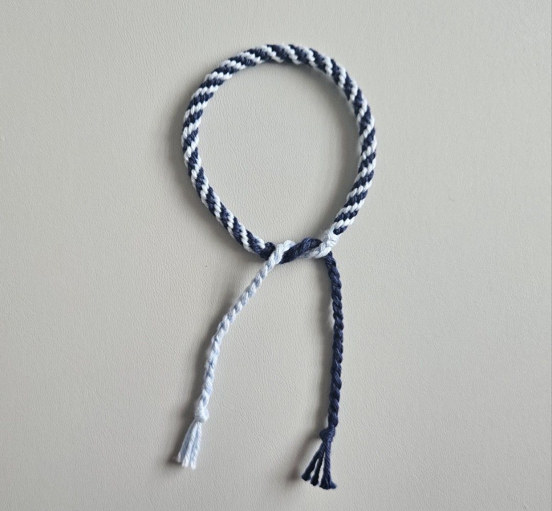 Handmade bracelet - Navy Blue & Light Blue Spiral (Category: Bracelets) located in Bacoor. Submitted by amity.cord (Listing ID 1463386552, Image 2). Description: Handmade bracelet made from crochet yarn..