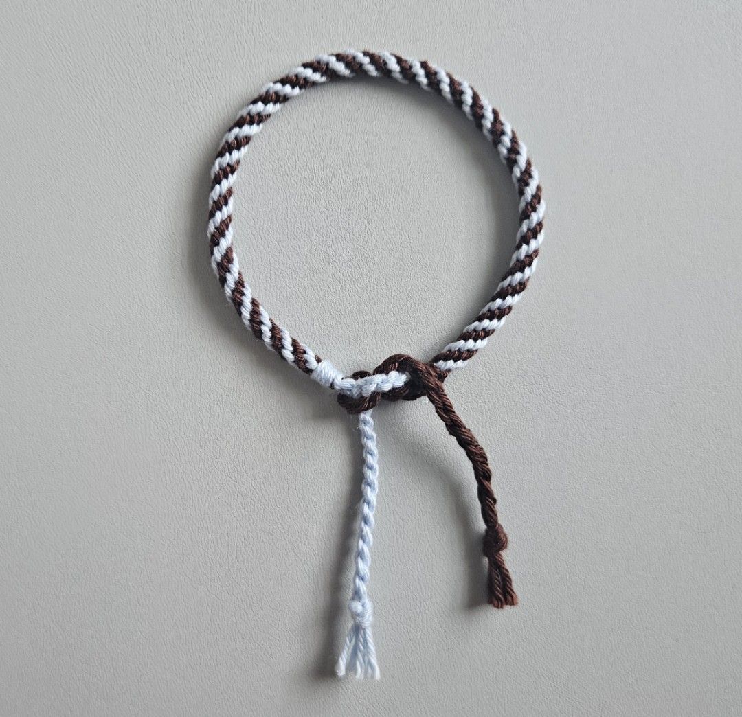 Handmade Bracelet - Dark Brown & Light Blue Spiral (Category: Bracelets) located in Bacoor. Submitted by amity.cord (Listing ID 1463401506, Image 1). Description: Handmade bracelet made from crochet yarn..