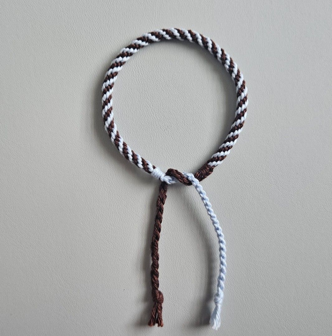Handmade Bracelet - Dark Brown & Light Blue Spiral (Category: Bracelets) located in Bacoor. Submitted by amity.cord (Listing ID 1463401506, Image 2). Description: Handmade bracelet made from crochet yarn..
