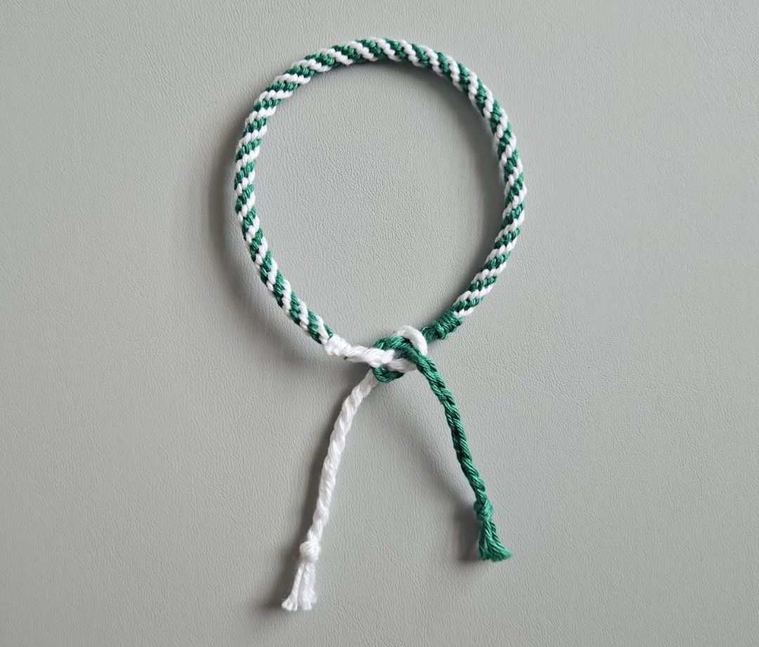 Handmade Bracelet - Green & White Spiral (Category: Bracelets) located in Bacoor. Submitted by amity.cord (Listing ID 1463399080, Image 1). Description: Handmade bracelet made from crochet yarn..