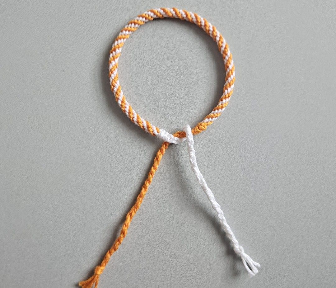 Handmade Bracelet - Light Orange & White Spiral (Category: Bracelets) located in Bacoor. Submitted by amity.cord (Listing ID 1463400850, Image 2). Description: Handmade bracelet made from crochet yarn..