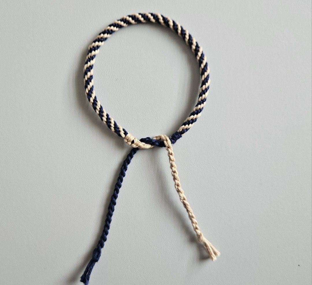 Handmade Bracelet - Navy Blue & Light Brown Spiral (Category: Bracelets) located in Bacoor. Submitted by amity.cord (Listing ID 1463398180, Image 2). Description: Handmade bracelet made from crochet yarn..