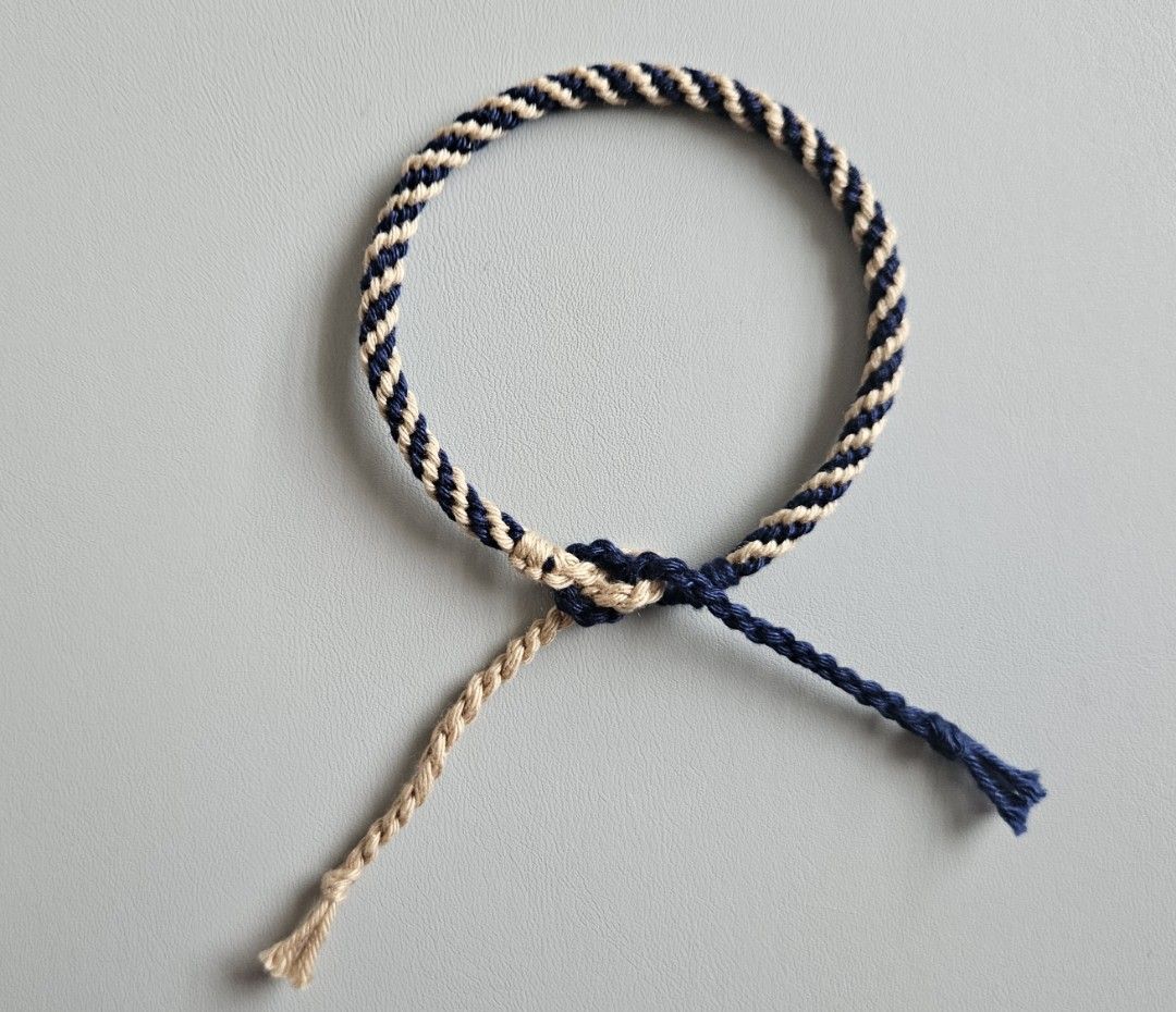 Handmade Bracelet - Navy Blue & Light Brown Spiral (Category: Bracelets) located in Bacoor. Submitted by amity.cord (Listing ID 1463398180, Image 1). Description: Handmade bracelet made from crochet yarn..