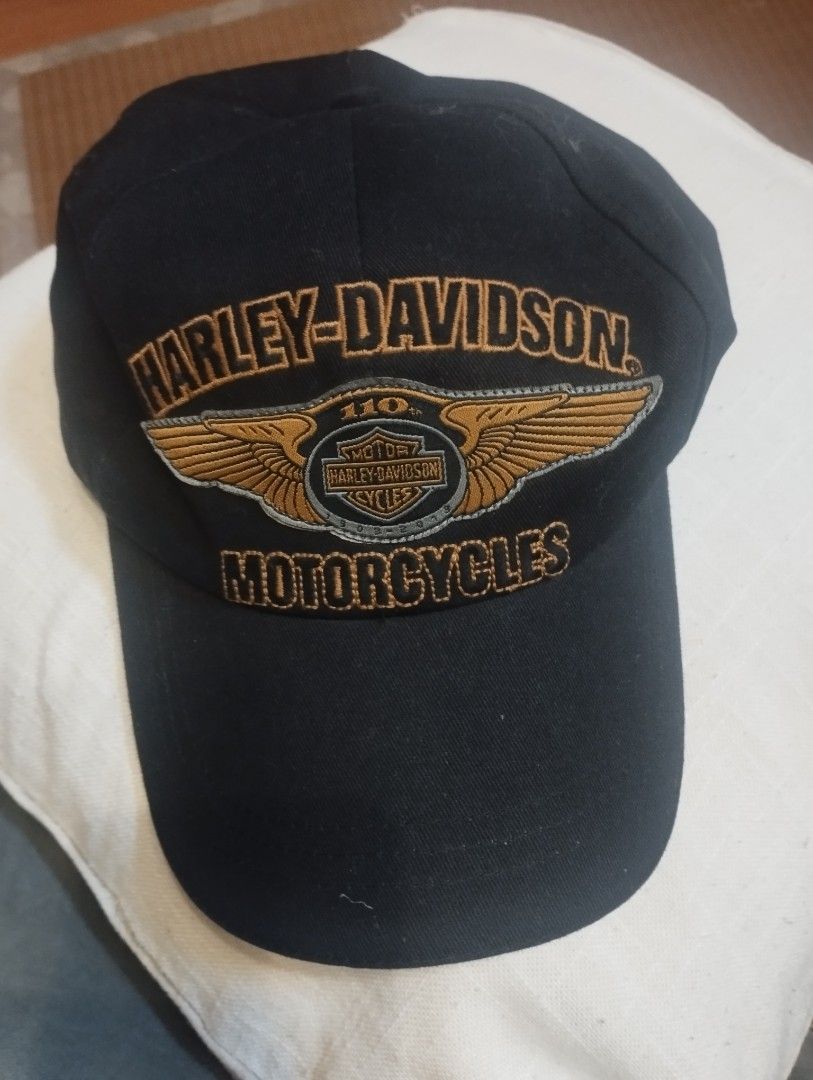 Harley-Davidson 110th Anniversary Motorcycles Baseball Cap (Category: Caps & Hats) located in Baguio. Submitted by katgon2016 (Listing ID 1463419262, Image 1). Description: - Authentic Harley-Davidson Cap - Commemorates 110th Anniversary - Features iconic wing logo and "Motorcycles" text - "Est. 1903" embroidered on the back - Adjustable strap with metal buckle for a custom fit - Ideal for any Harley-Davidson enthusiast.