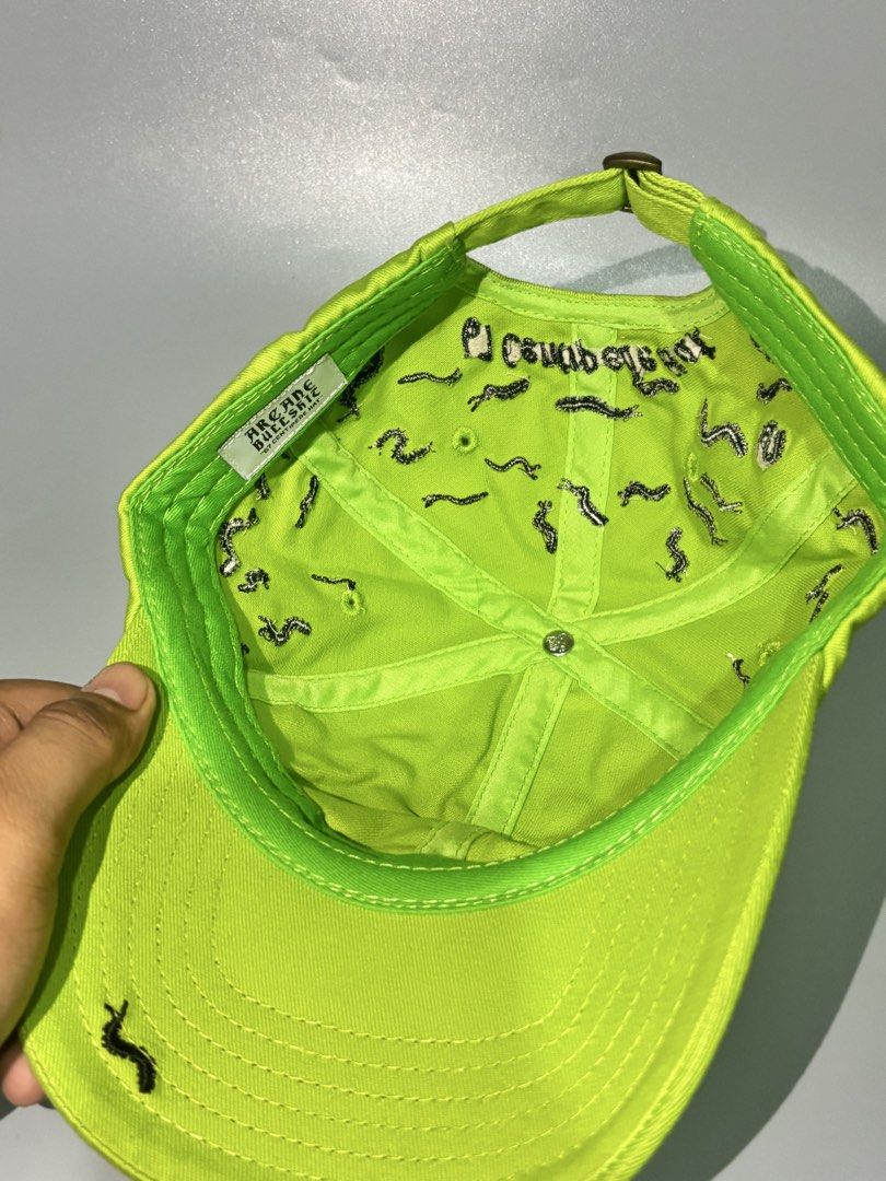 Hazardous Built 67 Centipede Hat Neon Green (Category: Caps & Hats) located in Manila. Submitted by gilmorecapz (Listing ID 1463441033, Image 3). Description: - Vibrant neon green cap - All-over black centipede embroidery - '67 Centipede Hat' embroidered on the back - Adjustable strap for a custom fit - Interior tag reads 'Hazardous Built' - Unique and eye-catching design.