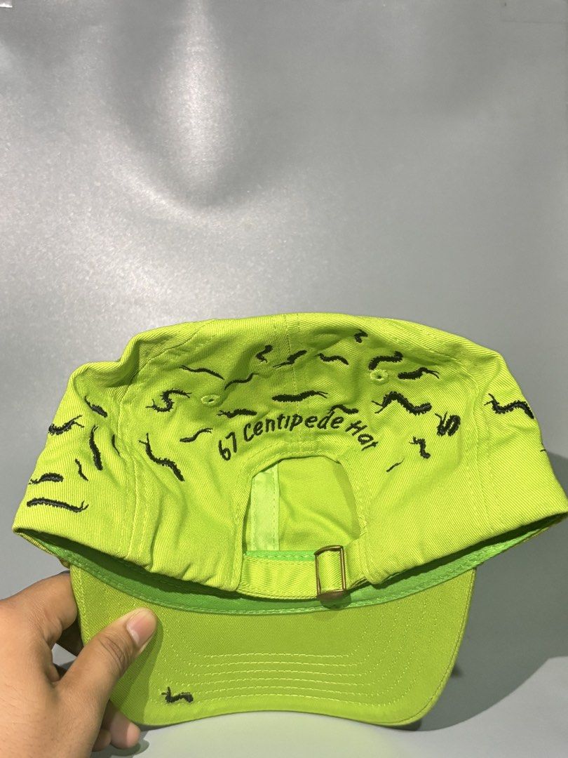Hazardous Built 67 Centipede Hat Neon Green (Category: Caps & Hats) located in Manila. Submitted by gilmorecapz (Listing ID 1463441033, Image 2). Description: - Vibrant neon green cap - All-over black centipede embroidery - '67 Centipede Hat' embroidered on the back - Adjustable strap for a custom fit - Interior tag reads 'Hazardous Built' - Unique and eye-catching design.