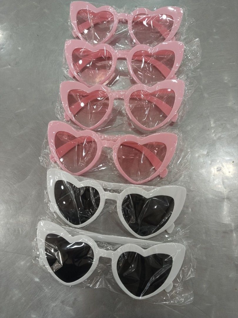 Heart Shaped Sunglasses - Pink & White (Category: Sunglasses & Eyewear) located in Manila. Submitted by zdmal (Listing ID 1463344430, Image 1). Description: - Adorable heart-shaped sunglasses - Available in cute pink and white colors - Ideal for parties, dress-up, or everyday fun - Each pair comes individually wrapped for gifting or personal use - A fun accessory for yourself or a friend!.