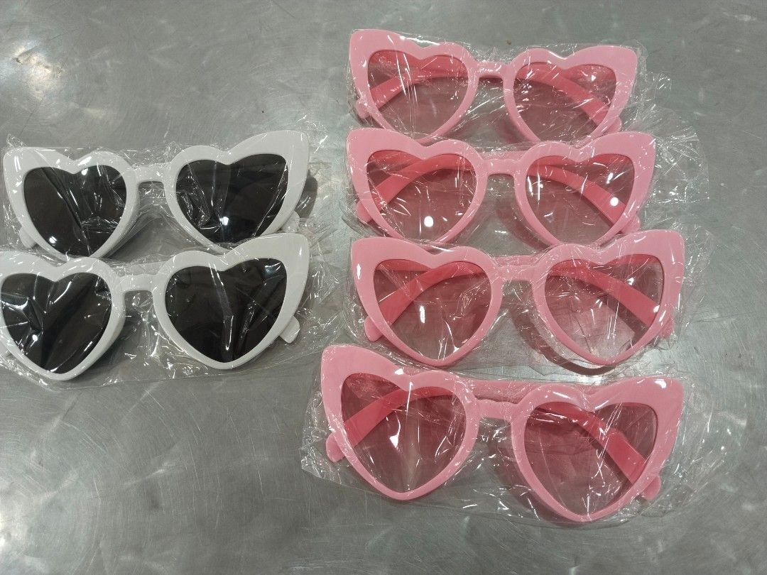 Heart Shaped Sunglasses - Pink & White (Category: Sunglasses & Eyewear) located in Manila. Submitted by zdmal (Listing ID 1463344430, Image 2). Description: - Adorable heart-shaped sunglasses - Available in cute pink and white colors - Ideal for parties, dress-up, or everyday fun - Each pair comes individually wrapped for gifting or personal use - A fun accessory for yourself or a friend!.