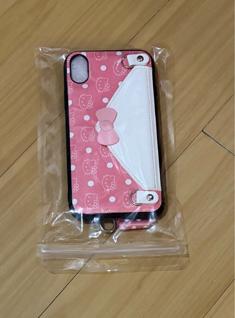 Hello Kitty iPhone XR Case with Lanyard/Strap (Category: Cases & Sleeves) located in Quezon City. Submitted by garagesale2026 (Listing ID 1463336225, Image 2). Description: - Never used - Price is per piece - 2 Designs available.