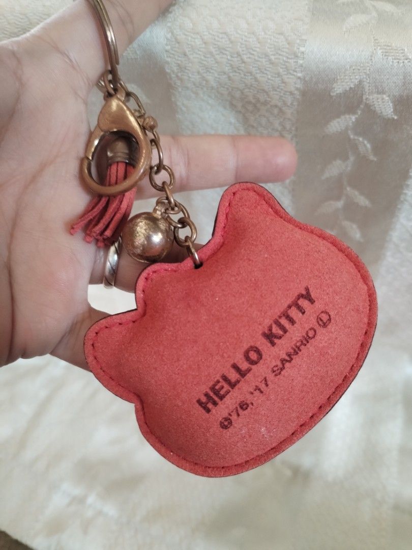 Hello Kitty Rhinestone Keychain with Tassel Charm (Category: Charms) located in Manila. Submitted by malditas (Listing ID 1463552662, Image 2). Description: - Adorable Kitty design - Covered in sparkling rhinestones - Features a cute red bow - Red suede back with Kitty logo - Includes a red tassel and a bell charm - Ideal for personalizing keys or bags From HT box BUY AS IS (NO RETURN, NO EXCHANGE, NO REFUND unless stated) LOCATION For dropping: 