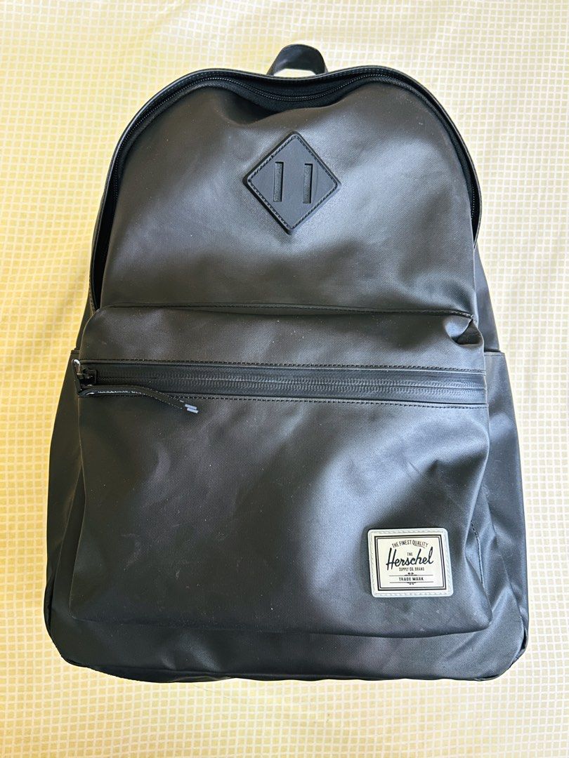 Herschel Classic XL Weather Resistant Backpack (Category: Backpacks) located in Makati City. Submitted by reese.stone (Listing ID 1463347396, Image 1). Description: - Brand: Herschel - Model: Classic XL - Color: Black - Material: Durable recycled polycoat - Features: Weather-resistant construction, front zippered pocket, side pockets - Comfort: Padded shoulder straps - Perfect for: Daily commutes, school, travel, and all-weather use - Only Cash, 