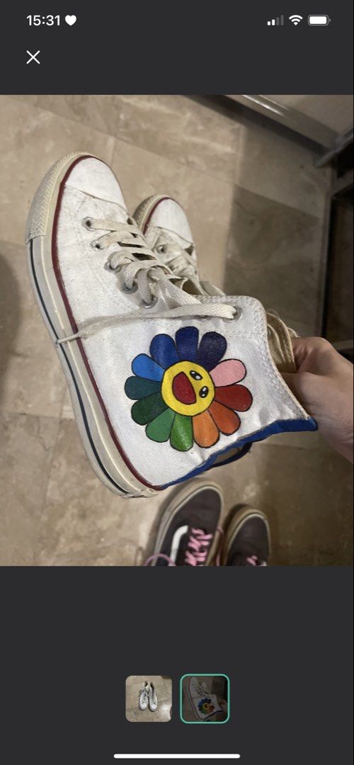 High cut converse white (Category: Sneakers) located in Quezon City. Submitted by rish40 (Listing ID 1463395639, Image 2). Description: - Custom painted Converse high-tops featuring the iconic Murakami smiling flower design. - Classic white canvas with rubber toe cap. - Laces show some wear. - Soles have minor dirt. - Plenty of life left for your next adventure!.