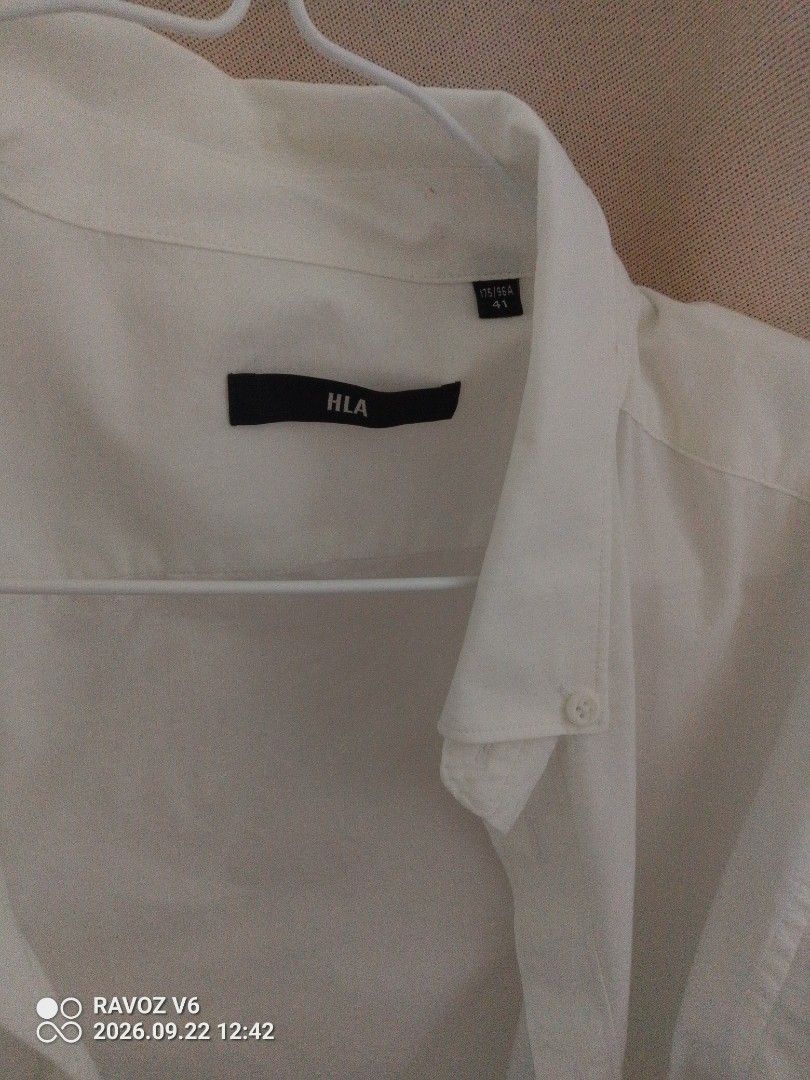 HLA White Short Sleeve Button Up Shirt (Category: Tshirts & Polo Shirts ) located in Manila. Submitted by judyanncle05962 (Listing ID 1463397367, Image 2). Description: - HLA White Short Sleeve Button-Up Shirt - Classic and versatile style - Perfect for casual wear or layering - Features button closure down the front - Button details on the collar - Standard fit, easy to pair with any outfit.