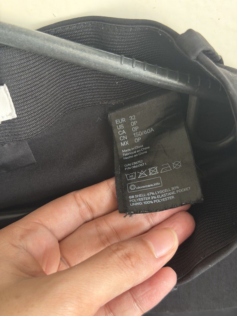 H&M Black Tailored Pants (Category: Other Bottoms) located in Taguig. Submitted by anjielamarie_ (Listing ID 1463373362, Image 3). Description: - H&M Black Tailored Pants - Size: EUR 32 / UK 4 - Material: Lyocell and Polyester blend - Made in China - Perfect for work or casual outfits - Comfortable fit.