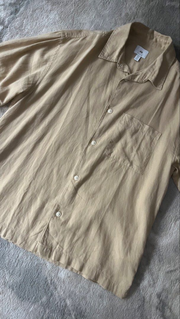 H&M Linen Shirt (Category: Formal Shirts) located in Rizal. Submitted by unboxed_beginnings (Listing ID 1463353847, Image 3). Description: Pre-loved H&M Short Sleeve Linen Shirt (Beige) 500 php + SF (slightly neg) Almost brandnew condition (9.8/10 color rate) Cainta Rizal location Payment first, pass COD/COP.