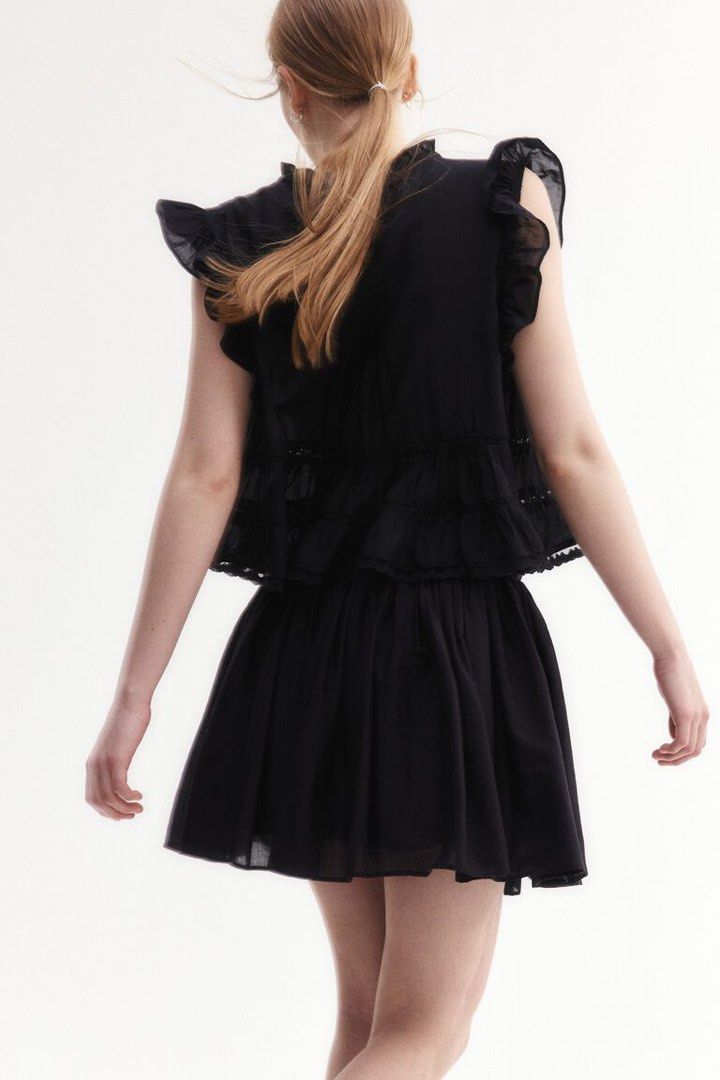 H&M PINTUCKED BLOUSE BLACK (Category: Sets or Coordinates) located in Angeles City. Submitted by chic.haven (Listing ID 1463330612, Image 3). Description: - Cute black peplum top with ruffle trim on sleeves and neckline. - Lightweight fabric, ideal for warmer weather..