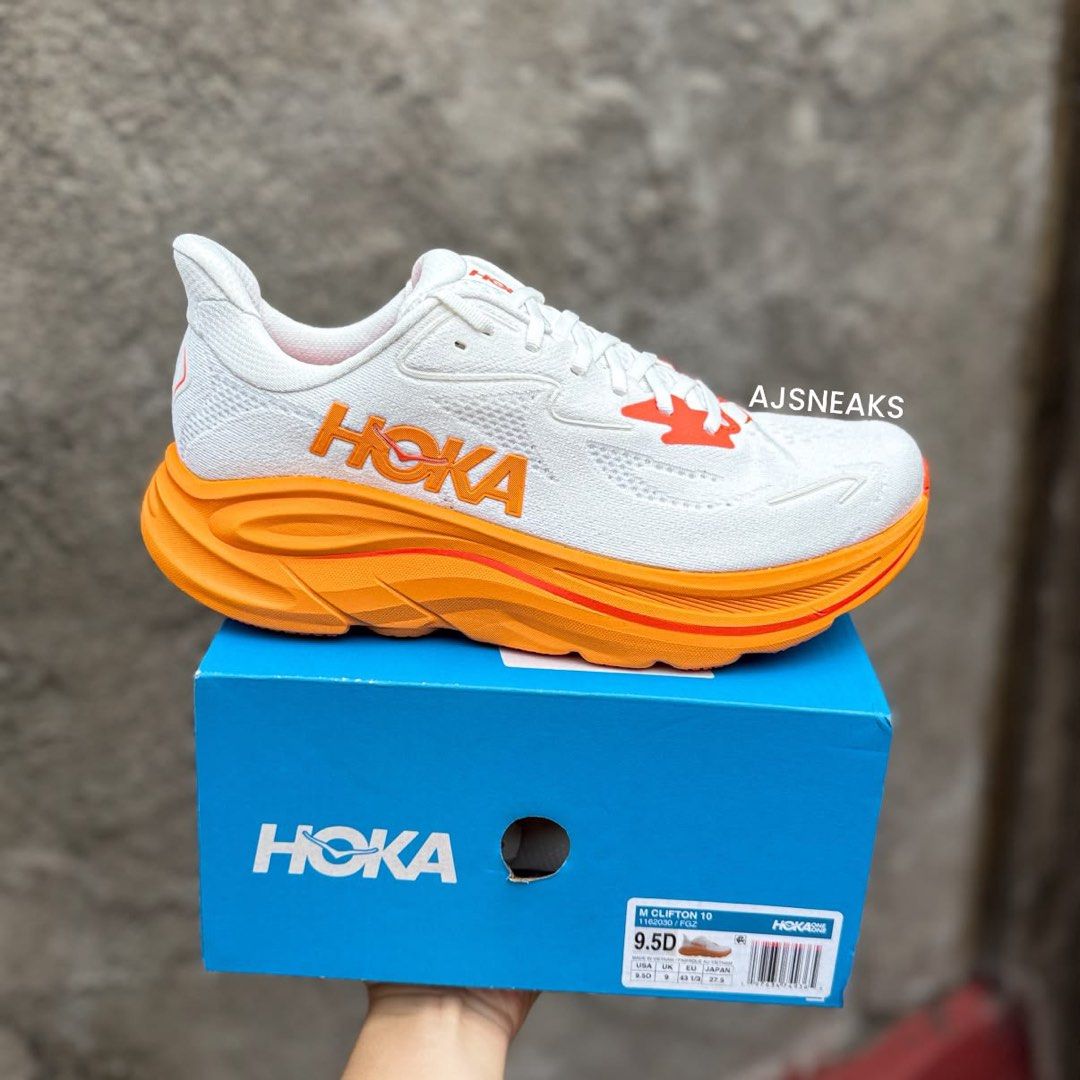 HOKA Clifton 10 White Orange (Category: Sneakers) located in Liloan. Submitted by ajsneaks (Listing ID 1463504575, Image 1). Description: HOKA Clifton 10 Mens Available size: 9.5 MENS (27CM) Price: ₱4,490 + SHIPPING FEE! ✅ (WAY BELOW MALL PRICE) ❌ 100% Original | Brand new with box! 💯 (10X MONEY BACK IF PROVEN FAKE) MOP: GCASH | BDO | BPI ✅ Vouches? Reference? Check us all you want Only here at AJSneaks!.