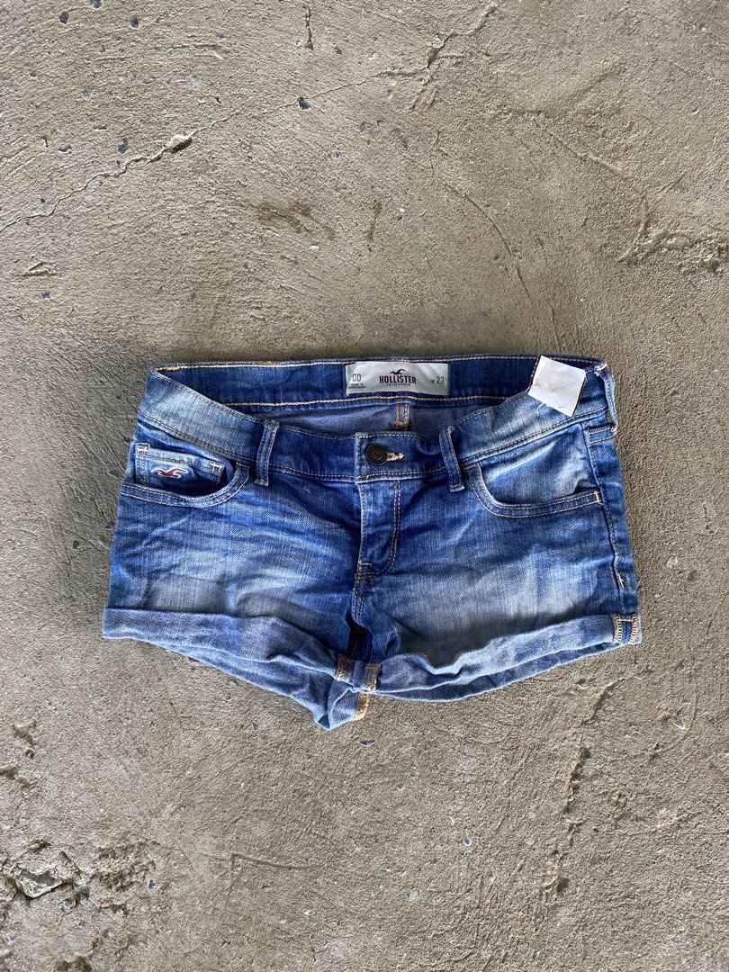 Hollister Denim Shorts W23 (Category: Shorts) located in Sinait. Submitted by rinzuthrift (Listing ID 1463553834, Image 1). Description: - Cute blue denim shorts from Hollister - Size: W23 - Classic five-pocket style - Button and zip closure - Rolled hem detail - Ideal for casual wear - Made in Bangladesh.