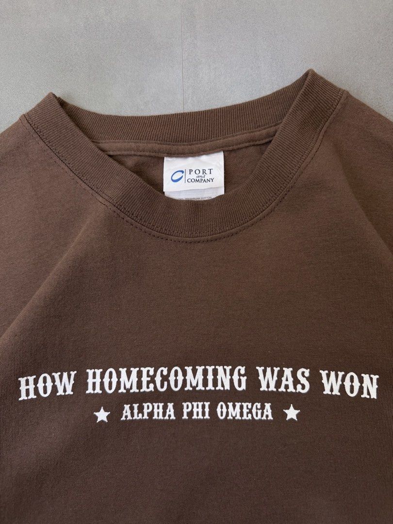 Homecoming chocolate brown tee shirt (Category: Tshirts & Polo Shirts ) located in Santa Rosa. Submitted by arvintage.ph (Listing ID 1463428224, Image 2). Description: Tagged: Large on tag Width 22” | Length 29” Condition: Excellent condition Issue(s): -.