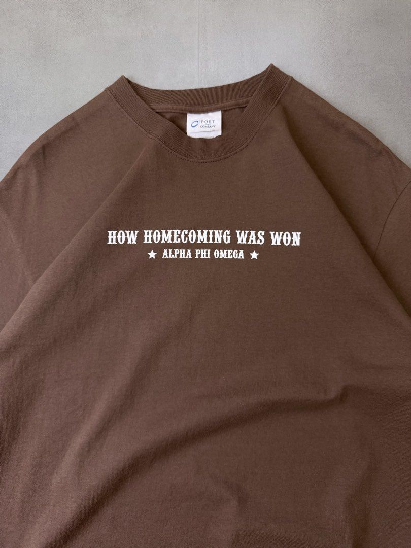 Homecoming chocolate brown tee shirt (Category: Tshirts & Polo Shirts ) located in Santa Rosa. Submitted by arvintage.ph (Listing ID 1463428224, Image 3). Description: Tagged: Large on tag Width 22” | Length 29” Condition: Excellent condition Issue(s): -.