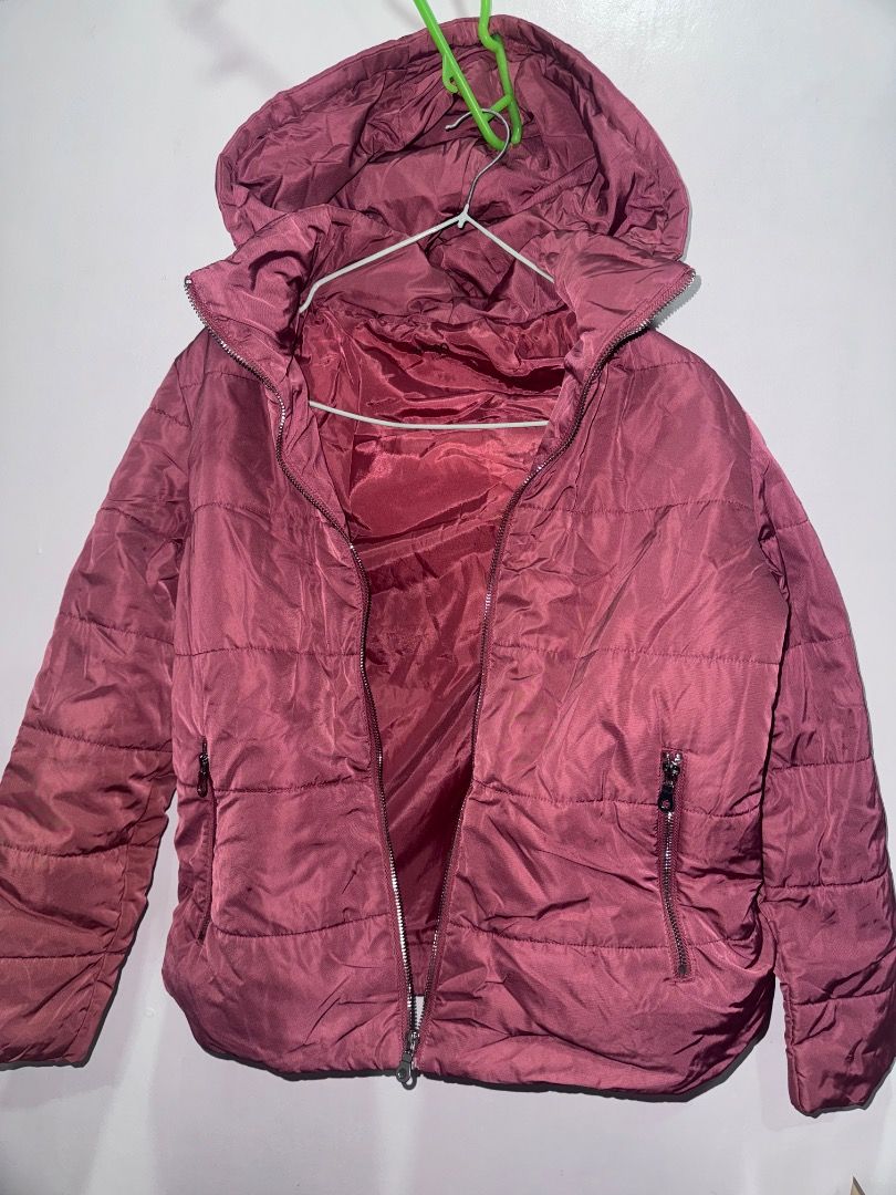 Hooded Puffer Jacket (M) (Category: Coats, Jackets and Outerwear) located in Las Pinas. Submitted by stroberriii (Listing ID 1463398757, Image 1). Description: - Color: Mauve / Dusty Rose - Size: M - Detachable Hood - Full zip front closure - Two zippered hand pockets .