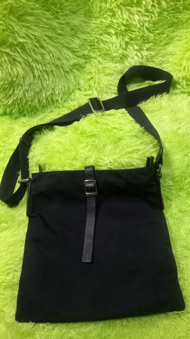 Hotwind Black Nylon Crossbody Bag (Category: Cross-body Bags) located in Manila. Submitted by twinklelyn03 (Listing ID 1463388356, Image 1). Description: - Brand: Hotwind - Color: Black - Material: Nylon - Style: Crossbody bag - Features: Multiple interior compartments for organization - Strap: Adjustable with leather accents - Closure: Leather accents - Ideal for: Everyday use, carrying essentials see photos for details pm sa sure buyer only tha