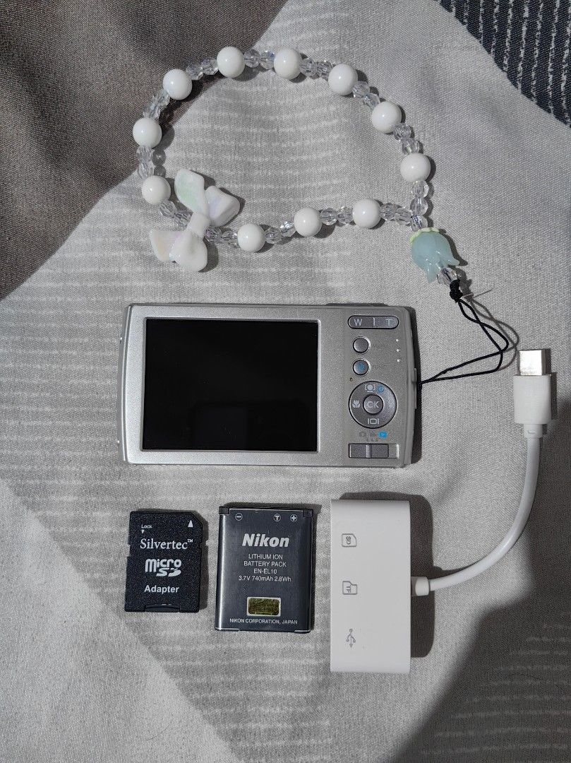 HP s300 14.2 Megapixels Digital Camera with Accessories (Category: Cameras) located in Pasay City. Submitted by roe.sell (Listing ID 1463369375, Image 2). Description: - HP s300 Digital Camera - 14.2 Megapixels - 4x Optical Zoom Lens Inclusions: - Nikon Battery - Silvertec Micro SD 32gb - USB Card Reader - Cute Beaded Strap - Universal Charger :Tested and Working : Ideal for Casual Photography.