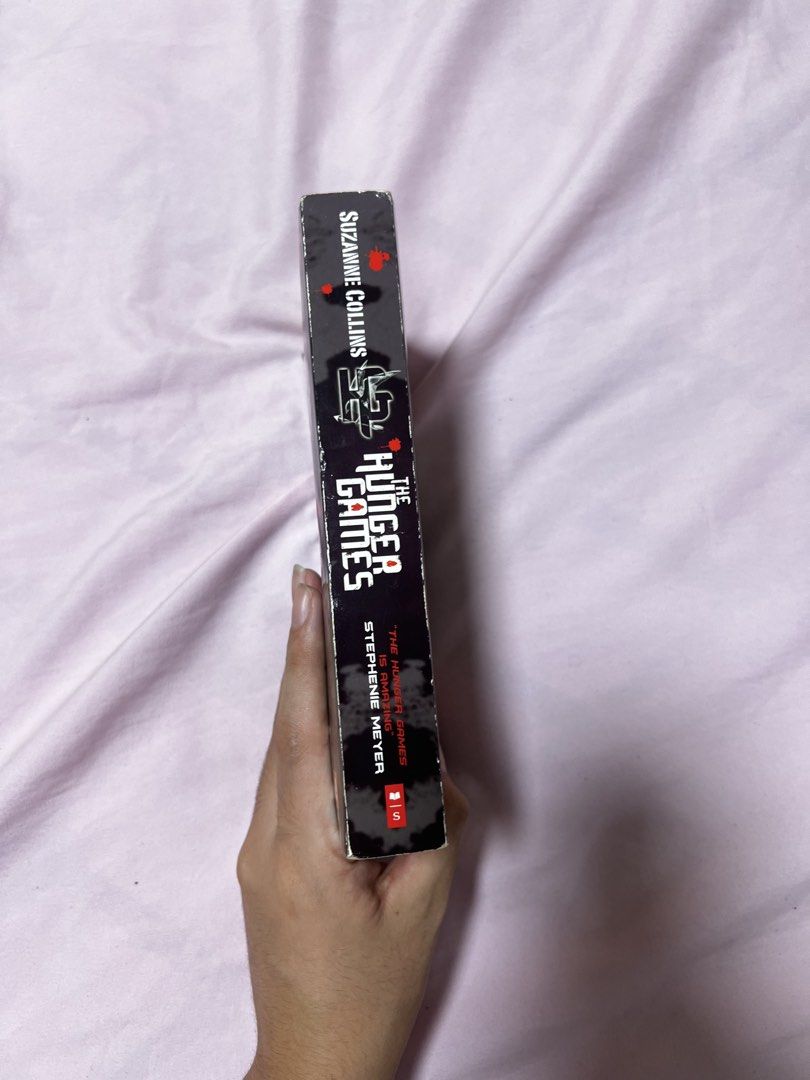 Hunger Games -Original Preloved (Category: Storybooks) located in Paranaque City. Submitted by smcc244 (Listing ID 1463391656, Image 3). Description: 150pesos RFS: Need Funds See the picture for flaws 📍Parañaque, Metro Manila 🚚Lalamove .