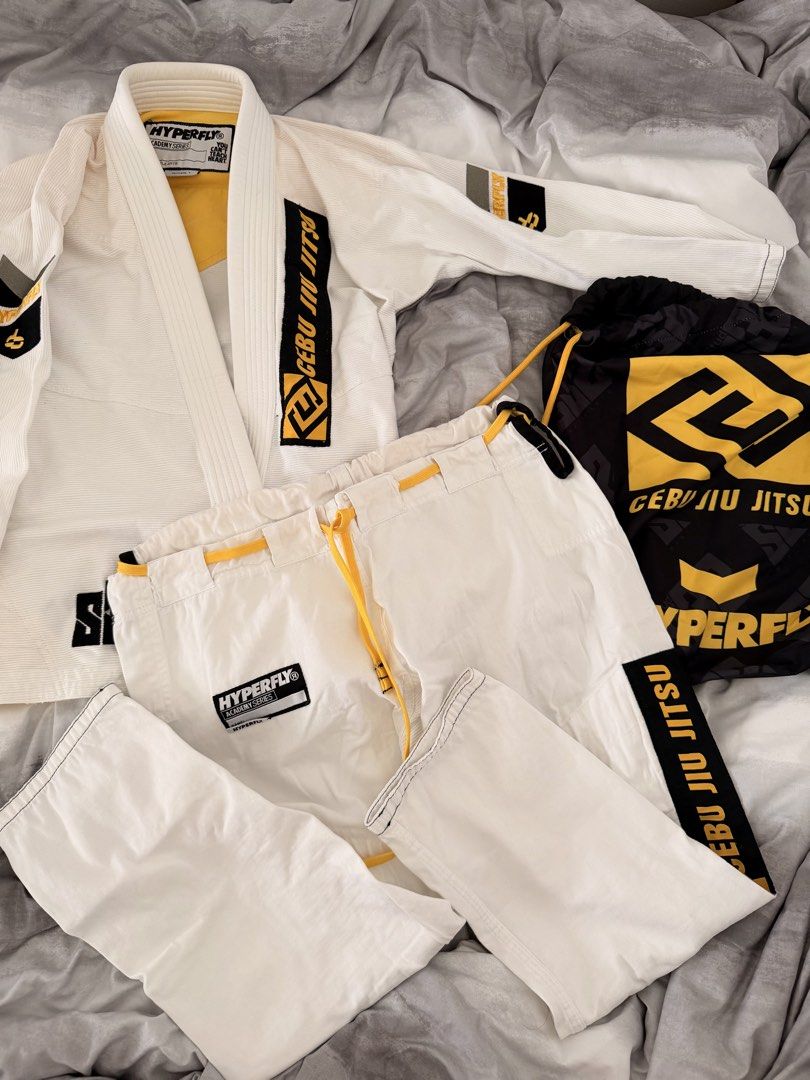 Hyperfly Cebu Jiu Jitsu f1 academy gi (Category: Combat Sports) located in Manila. Submitted by superbaba209 (Listing ID 1463357578, Image 1). Description: - White Hyperfly Jiu Jitsu Gi - Academy Series - Comes with a black and yellow Cebu Jiu Jitsu drawstring bag - Ideal for training.