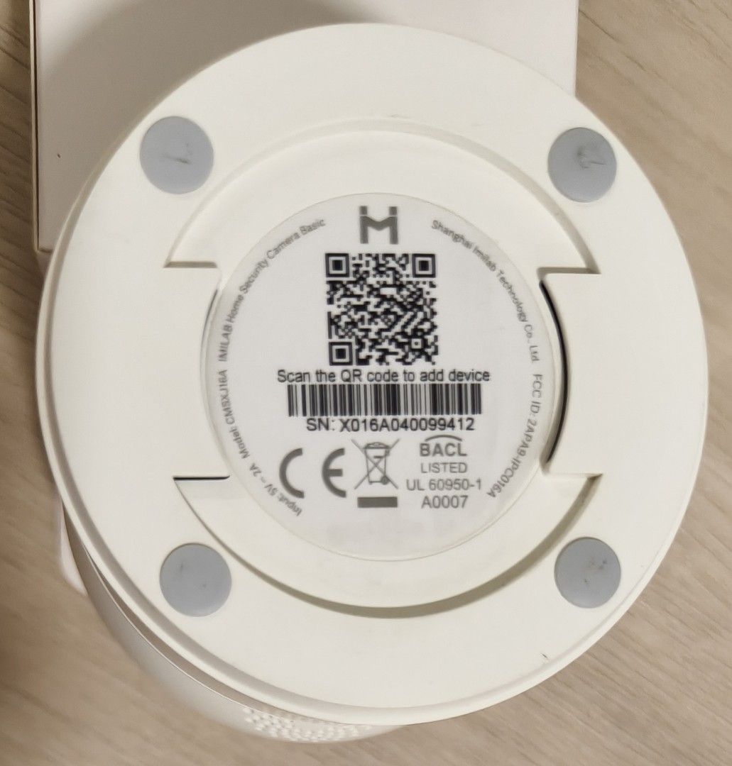 iMiLAB Home Security Camera Basic (Category: Security Systems & CCTV Cameras) located in Singapore. Submitted by r3bbit (Listing ID 1463333613, Image 3). Description: - White rotating security camera - Model: CAMSXJ164 - Built-in speaker - USB-C power input (5V/1A) - Ideal for home security monitoring - Simple QR code setup.
