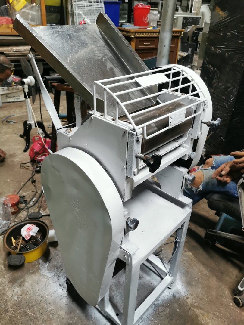 Industrial Dough Roller Machine for Sale (Category: Industrial Equipment) located in Manila. Submitted by marquezpa52205 (Listing ID 1463401893, Image 1). Description: - Heavy duty dough roller machine - Stainless steel hopper and rollers - Adjustable roller gap for various dough thicknesses - Sturdy metal frame for durability - Ideal for commercial kitchens and bakeries - Painted grey finish - Ready for immediate use.