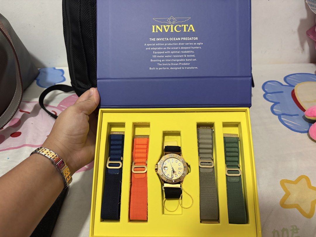 Invicta Ocean Predator Special Edition Watch Set (Category: Men's Watches) located in Pasig City. Submitted by antonyeeeta (Listing ID 1463358764, Image 2). Description: - Invicta Ocean Predator Special Edition Diver's Watch - 100 Meter Water Resistance - Gold-tone Case - Yellow Dial - Includes 4 Interchangeable Bands: Navy Blue, Orange, Olive Green, Dark Green - Built to Transform.