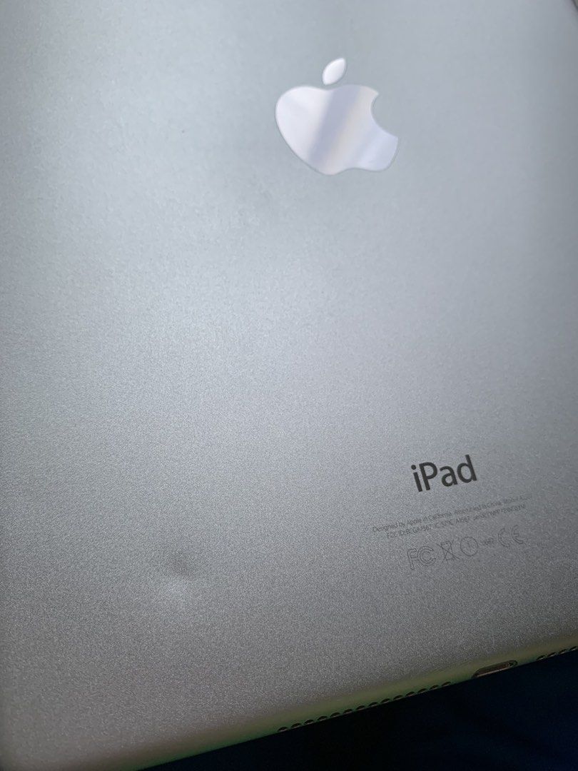 iPad Air 2 - with cellular (Category: iPad) located in Paranaque City. Submitted by cozbii (Listing ID 1463362229, Image 3). Description: iPad Air 2 64GB Wi-Fi + Cellular with screen protector and included case no history of repair issue: may minimal scratches/gasgas sa corners, may dent sa back as seen in the picture pero hindi affected ang performance. no hidden issues. message me if interested. RFS: Not being used / decluttering Location: Para