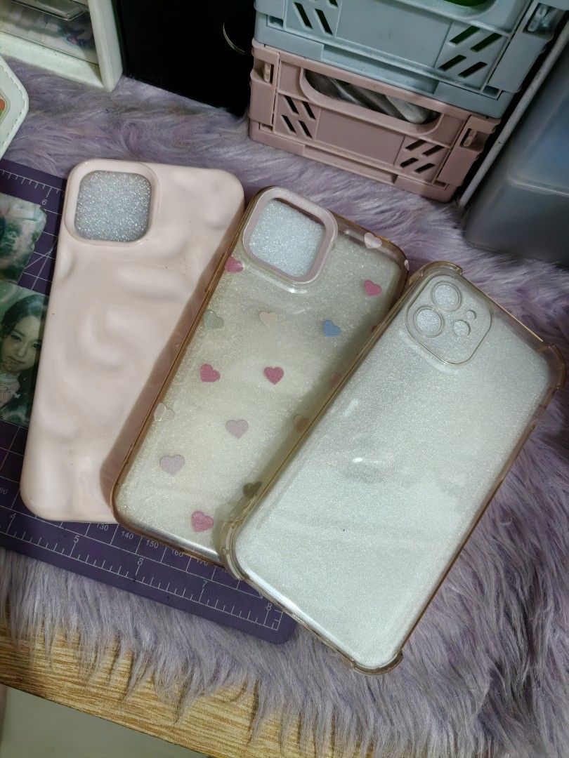 IPhone 12 cases (Category: Cases & Covers) located in Valenzuela. Submitted by kaoklaodz (Listing ID 1463510340, Image 1). Description: First 3 cases in photo have been used and are slightly discolored, the single flower case in the second photo is brand new and has never been used. -dm for more details -Loc: Valenzuela.